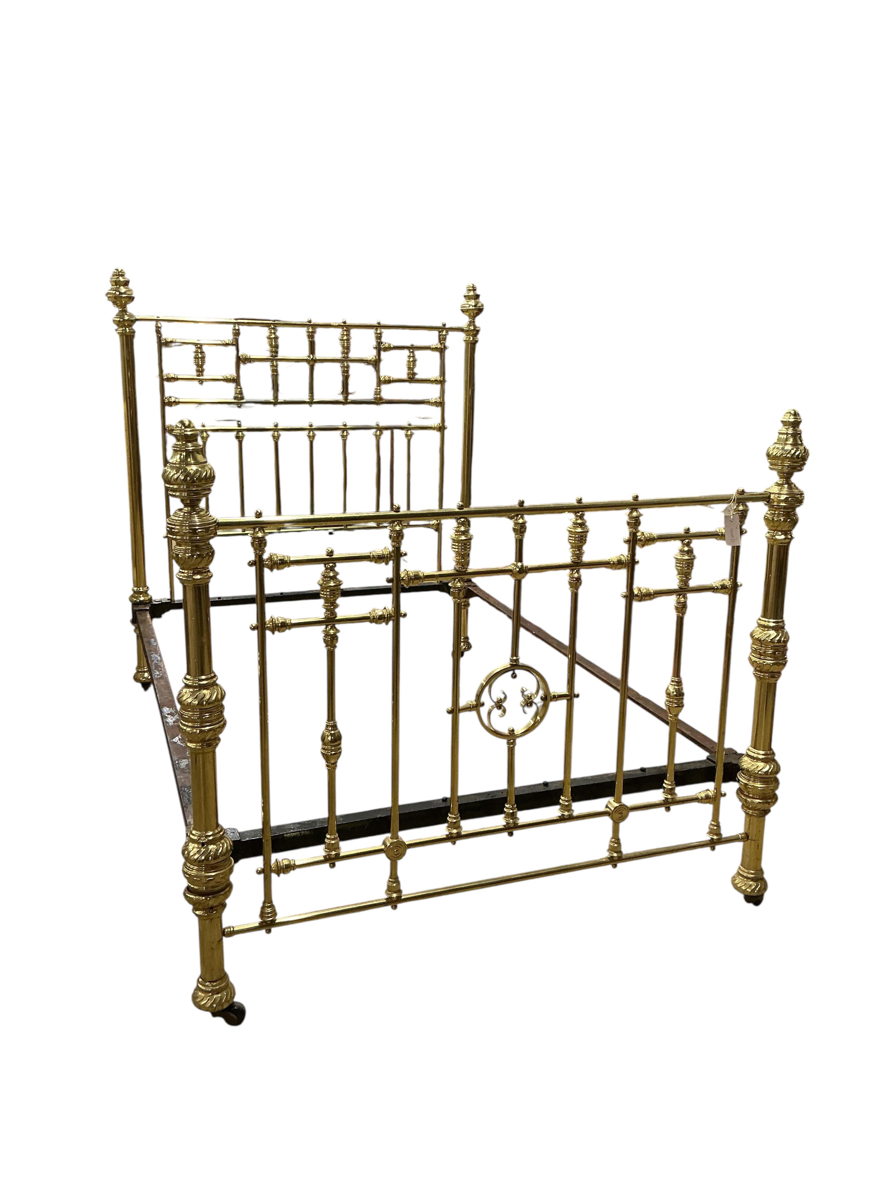 A Victorian brass bed frame, width 141cm, length 204cm, height 160cm